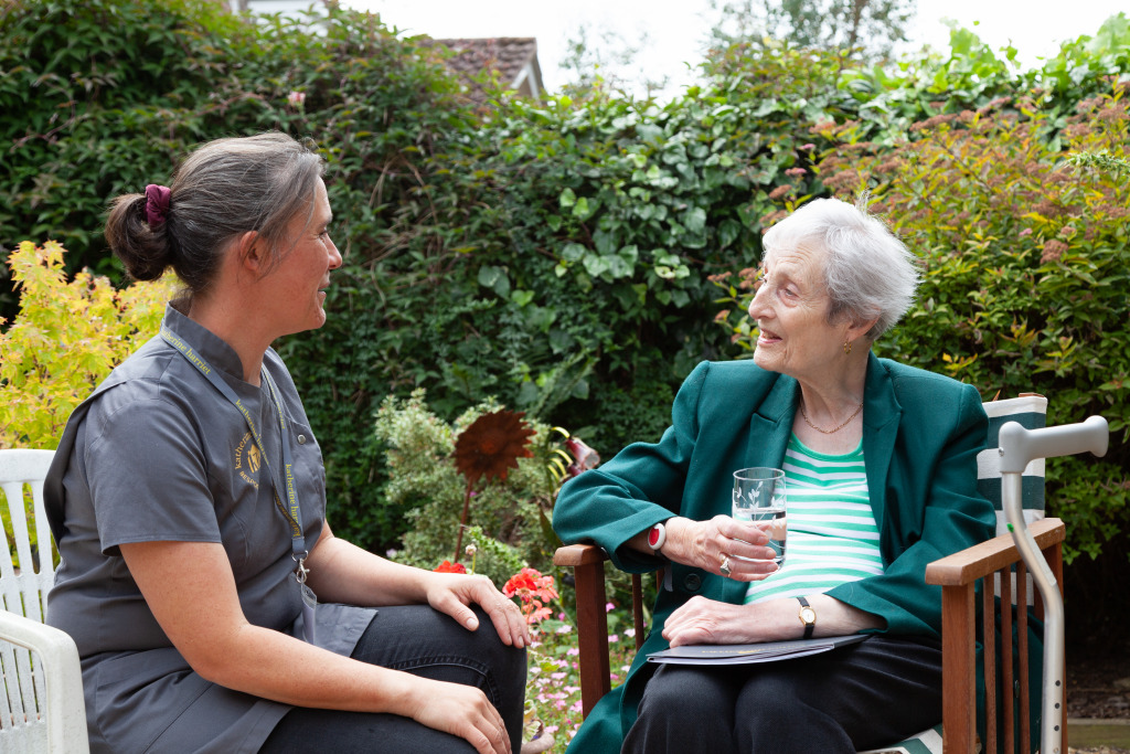 Client and carer in the garden